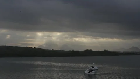 Timelapse of sunset over a lagoon, Macaé, Rio de Janeiro Stock Footage 317796325