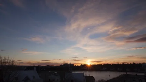 Timelapse of sunset over the lake and houses Stock Footage 73010959