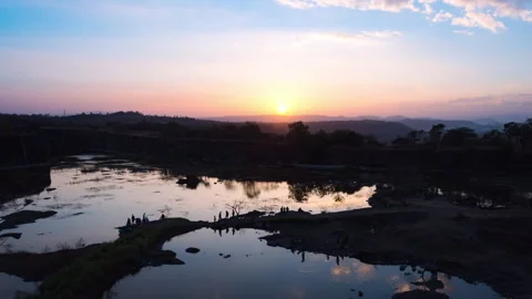 Timelapse - Sunset over a lake behind a mountian 4K30 Stock Footage 271079952