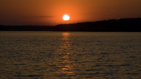 Timelapse of a Sunset Over a Lake Stock Footage 115272401