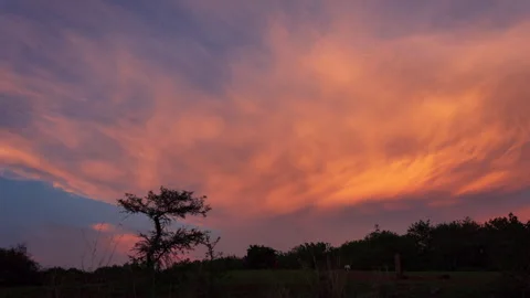 Timelapse - Sunset over landscape with colour explosion 4K60 Stock Footage 270431684