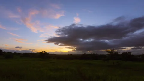 Timelapse - Sunset over a landscape with colour explosion 4K60 Stock Footage 271199627