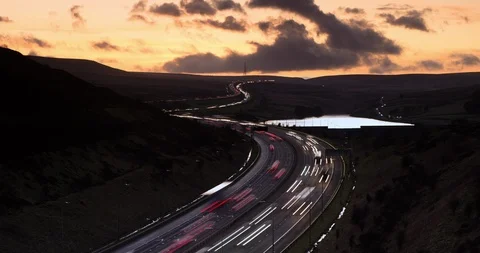 Timelapse of sunset over a motorway Stock Footage 124416385
