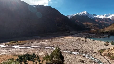 Timelapse of Sunset Over a Mountain Valley with Moving Shadows Stock-Footage 325763639