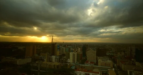 Timelapse of sunset over Nairobi skyline on a cloudy day. Kenya, Africa. Stock Footage 81587056
