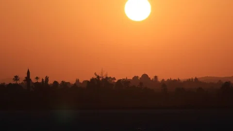 Timelapse of sunset over old Middle Eastern town in summer Stock Footage