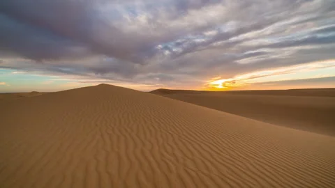 Timelapse of sunset over the sand dunes in the desert. Sahara desert Stock Footage 245225493