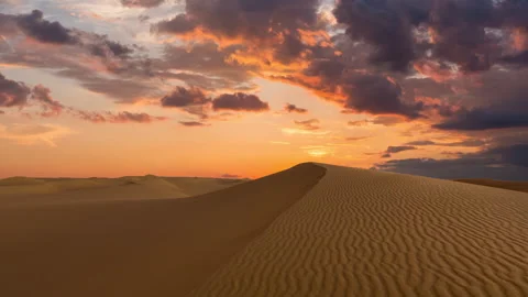 Timelapse of sunset over the sand dunes in the desert. Sahara desert Stock Footage 247897245