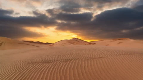 Timelapse of sunset over the sand dunes in the desert. Sahara desert Stock Footage 267667602