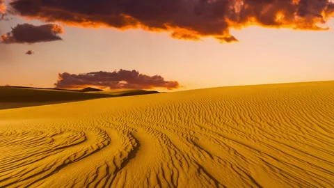 Timelapse of sunset over the sand dunes in the desert. Sahara desert Stock Footage 277865053