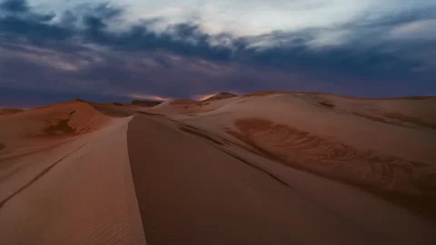 Timelapse of sunset over the sand dunes in the desert. Sahara desert Stock Footage 277893792