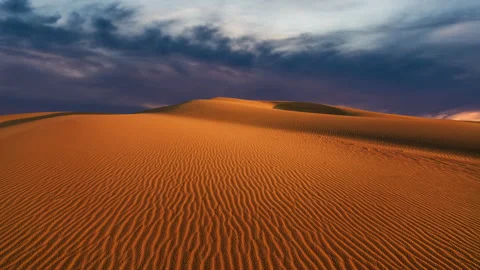 Timelapse of sunset over the sand dunes in the desert Stock Footage 277894336