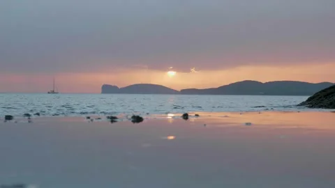 Timelapse of a sunset over the sea Video stock 232435541