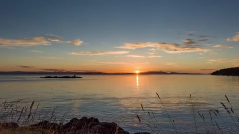Timelapse sunset over the sea on San Juan Island, Washington, USA Stock Footage 135438287