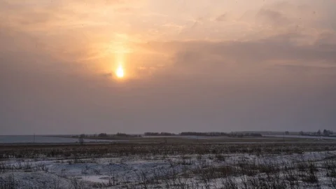 Timelapse of a sunset over a winter snow filled Stock Footage 122081981