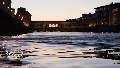 Timelapse of sunset on Ponte Vecchio in Florence near river, Tuscany, Italy Stock Footage 153496211