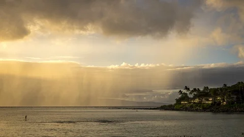 Timelapse of Sunset Rain with Smoothly Moving Clouds Over Maui and Molokai Stock Footage 128992240