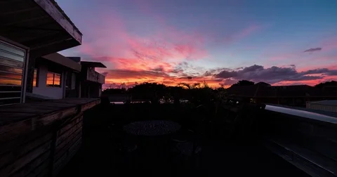 Timelapse Sunset Rooftop Clouds Tahiti Island 4K Stock Footage 84493725
