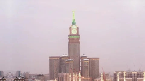 Timelapse of sunset on the Royal Clock Tower building in Mecca Stock Footage 312761623