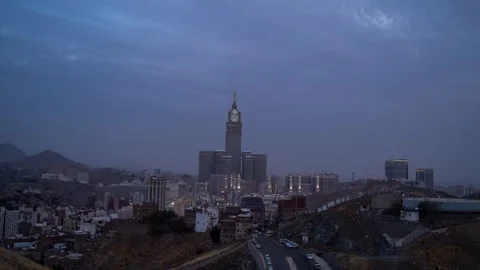 Timelapse of sunset on the Royal Clock Tower in the Holy Mosque in Mecca Stock Footage 312761632