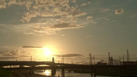Timelapse of sunset scene with cloud and city landscape in Osaka Stock Footage 313457513