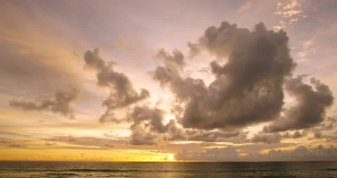 Timelapse sunset sea cloud warping red orange sky background beautiful Stock Footage 153380972