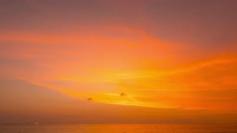 Timelapse sunset sea cloud warping red orange sky background Phuket Thailand Stock Footage 153381147