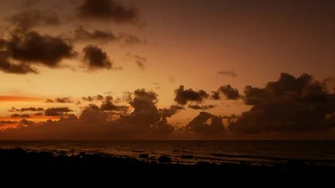 Timelapse of sunset at the sea with dramatic clouds Stock Footage 205597906