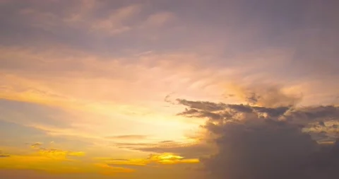 Timelapse sunset sea sunny cloud warping red orange sky background beautiful Stock Footage 153380785