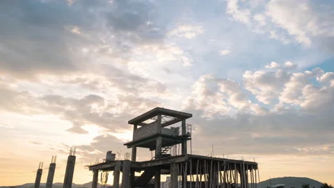 Timelapse of sunset sky with construction building Stock Footage 168898745