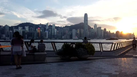 Timelapse of Sunset in Tsim Sha Tsui water front; Video stock 142335963