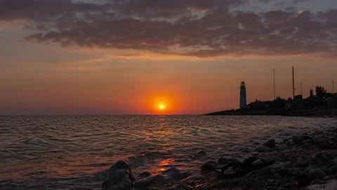 Timelapse sunset with a view of the lighthouse. Video stock 147039493