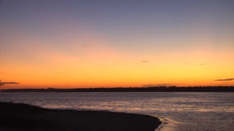 Timelapse Sunset on waterway beach 2, 12fps @1900% Stock Footage 24456464