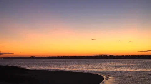 Timelapse Sunset on waterway beach 2, 12fps @600% Stock Footage 24456894