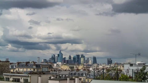 Timelapse of sunsetting over La Defense skyline in Paris Vídeos de archivo 76431514