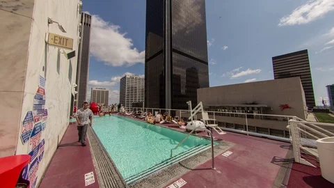 Timelapse of a swimming pool at a rooftop lounge in downtown Los Angeles Stock Footage 70770184