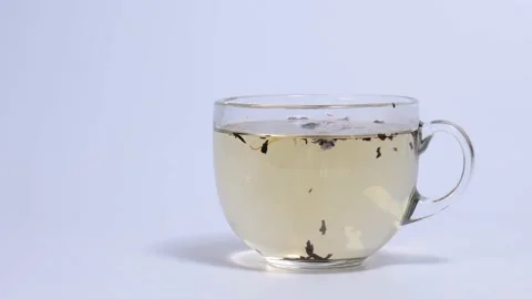 Timelapse of tea brewing in a transparent mug Stock Footage 147242574