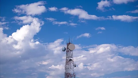 Timelapse of telecommunication tower against blue sky Stock Footage 101179145