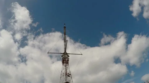 Timelapse of Telecommunication tower with moving clouds Stock Footage 62390008