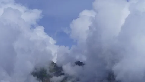Timelapse of Thick Clouds Forming Over Himalayan Peaks  Blue Sky Breakthrou.. Stock Footage 316360611