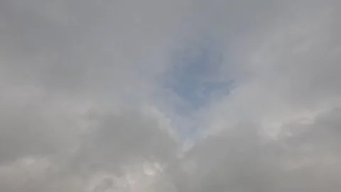 Timelapse of thick fog quickly covering the blue sky Stock Footage 320924426