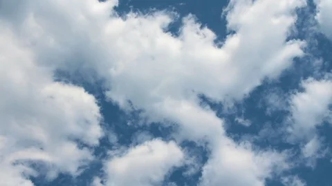 Timelapse Thick White Boiling Clouds on Blue Sky Detail 1 Stock Footage 85706240