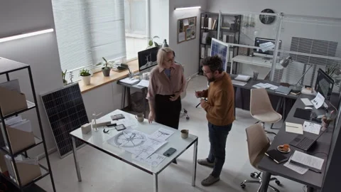 Timelapse of Three Diverse Engineers Working on Renewable Energy Projects Stock Footage 313586580