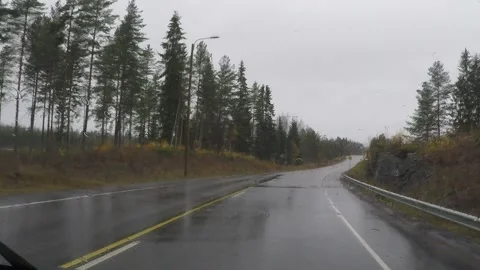 Timelapse through windshield while driving in rain Stock Footage 144981659