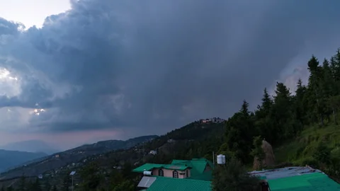 Timelapse - Thunder and rainclouds over a Valley 4K30 Stock Footage 268062421