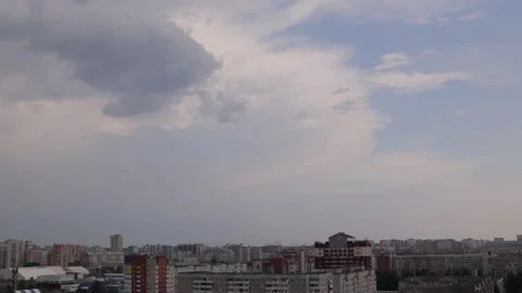 Timelapse thunderclouds over the city Stock Footage 134338078