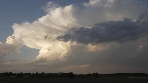Timelapse of Thunderhead Thunderstorm Billowing at Sunset Video stock 241015772