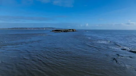Timelapse of tide going out on Hilbre Island Stock Footage