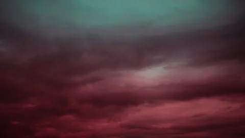 Timelapse, time lapse Dramatic red and green muted storm clouds creating a mood Stock Footage 341169161