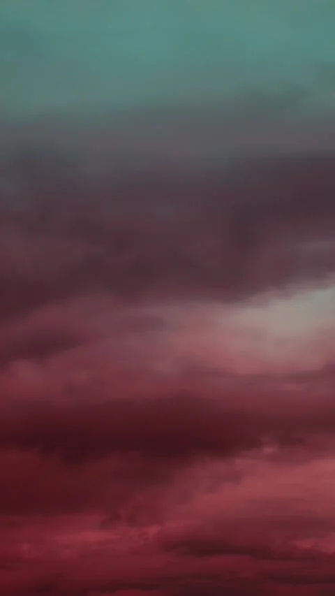Timelapse, time lapse Dramatic red and green muted storm clouds creating a Stock Footage 341367867